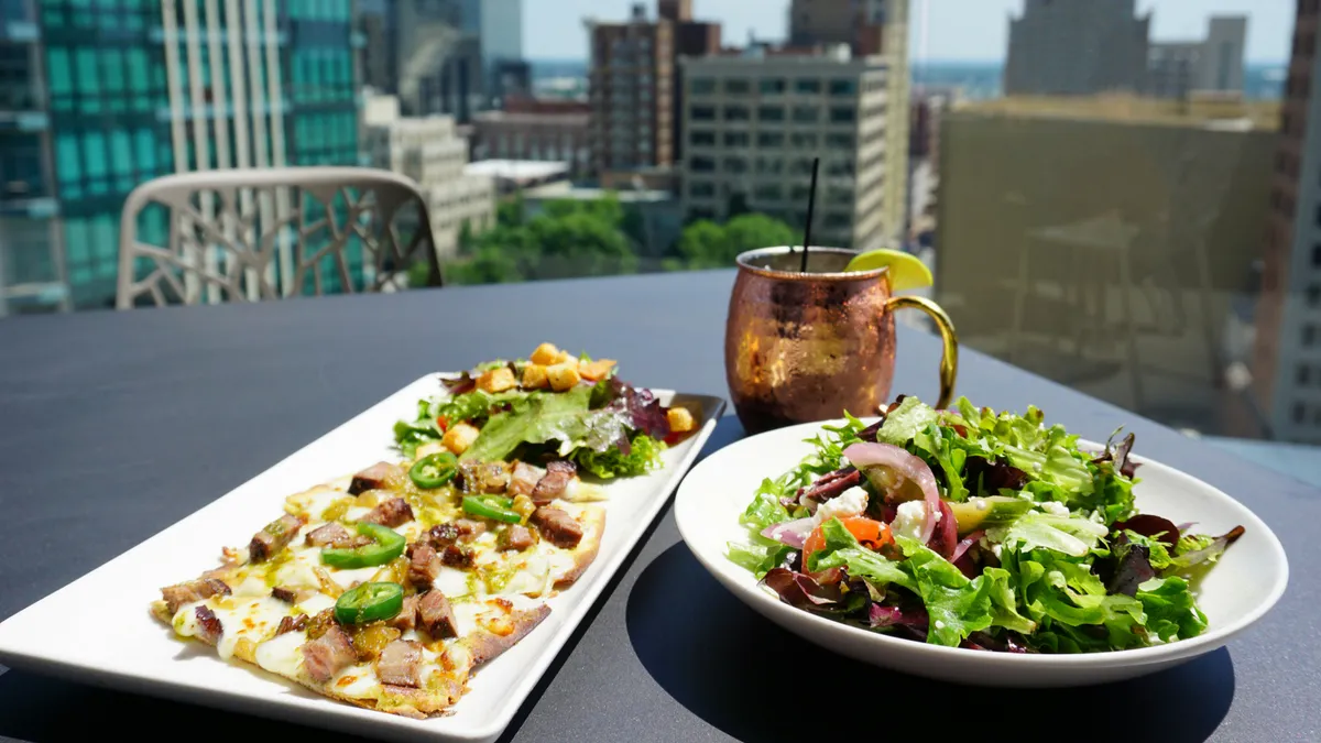 Branch & Bird signature dishes California Chicken Flatbread, Sliced Ribeye Sandwich, Blackened Redfish Tacos.